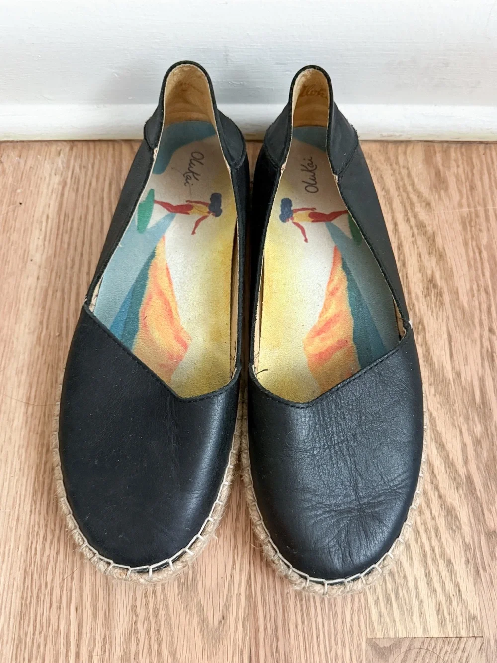 OluKai Kaula Pa'A 'Ili black leather slip-on espadrille flats